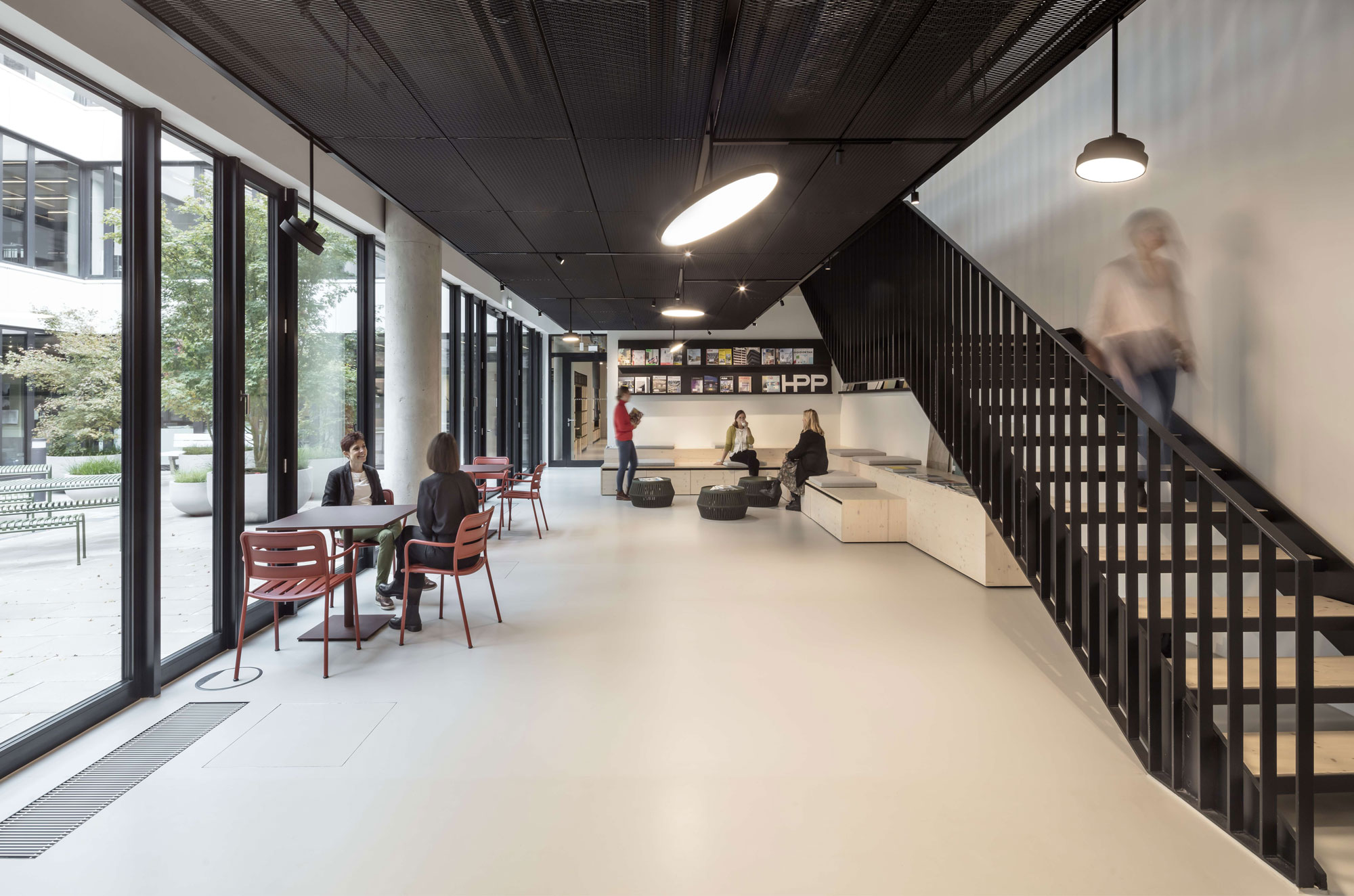 Well-balanced lighting in the break room of a health centre creates a pleasant environment for employees to relax.